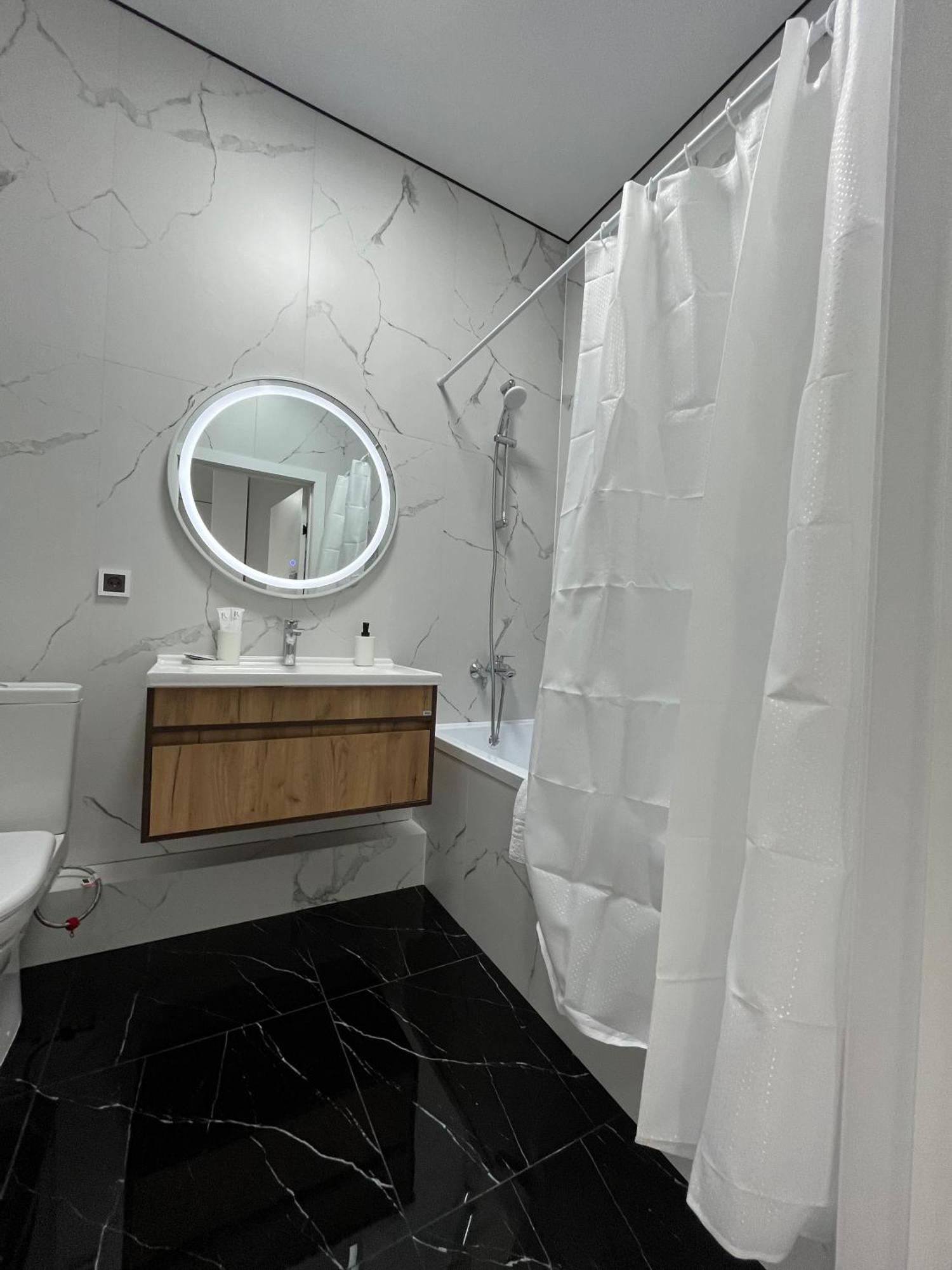 Raisson Aparthotel G32 Хан Шатыр อัสตานา ภายนอก รูปภาพ